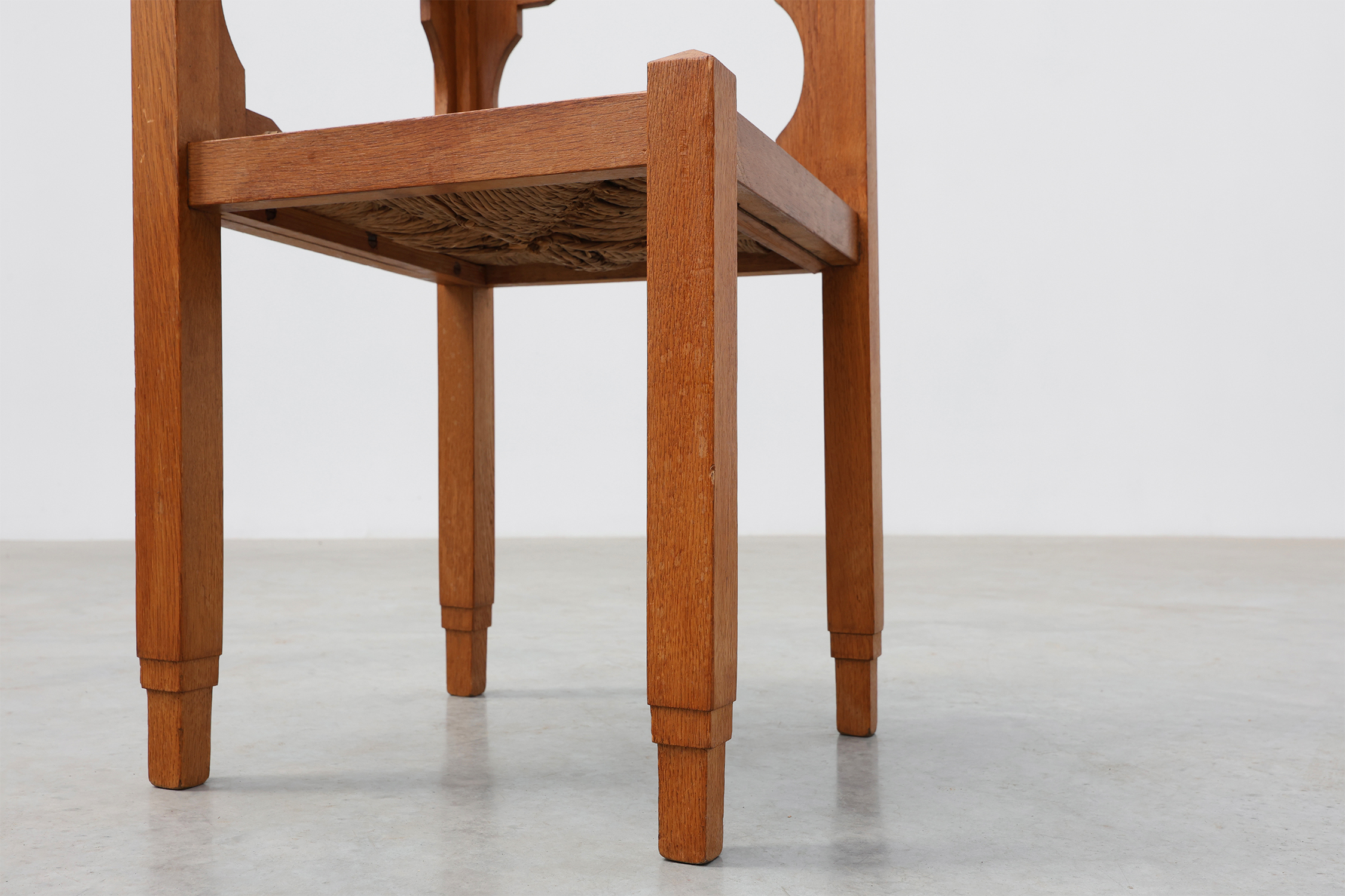 Art Deco Oak Corner Chair with Cut‑Out Backrest and Rush Seat, Belgium, circa 1920thumbnail